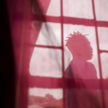 A young transgender woman at a friend’s house seeking temporary shelter in Lilongwe, Malawi. 