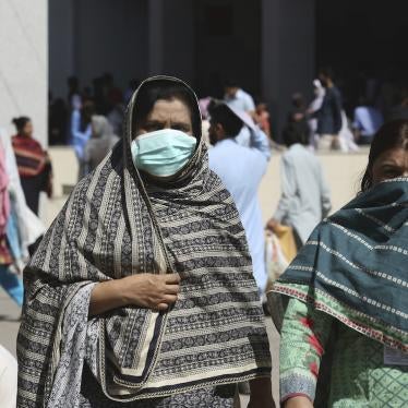 Pakistani women wearing face masks leave the Aga Khan hospital where a patient suspected of having contracted coronavirus was admitted, in Karachi, Pakistan, Thursday, Feb. 27, 2020. 