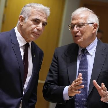 Yair Lapid, then Israeli foreign minister and current prime minister, speaks with the EU’s High Representative for Foreign Affairs and Security Policy Josep Borell during a July 2021 meeting of EU foreign ministers in Brussels.