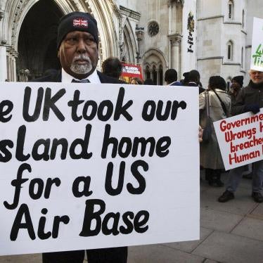 Rosemond Sameenaden joins other Chagos islanders outside the High Court, London, where they are fighting the UK government for the reinstatement of their homeland. 