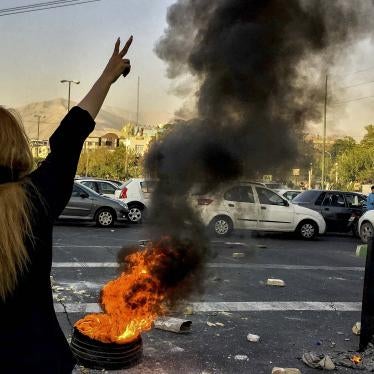 Iranians protests the death of 22-year-old Mahsa Amini after she was detained by the morality police, in Tehran, October 1, 2022.