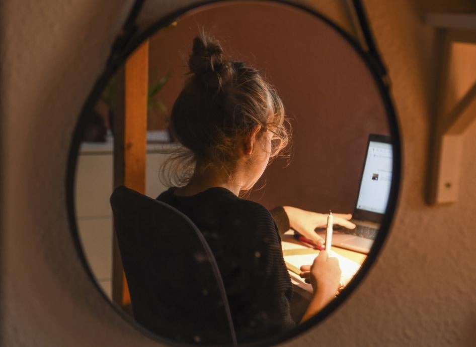 A girl studies online at home during Covid-19 school closures in Berlin.