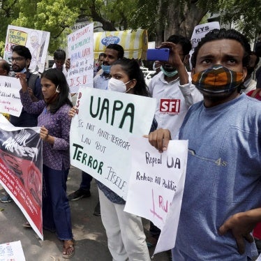 Activists demand justice for 84-year-old Father Stan Swamy, the Indian Jesuit priest and tribal rights activist, who had passed away earlier that month in New Delhi, July 23, 2021.