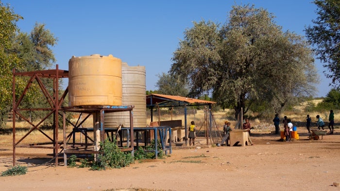 Children collecting water in Cunene province, Oncocua, Angola, July 14, 2018.