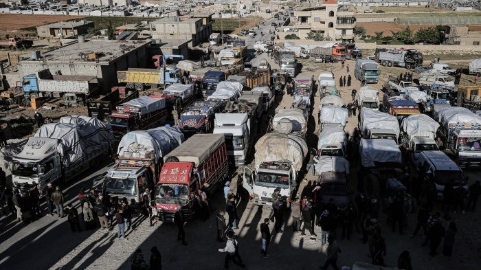 Syrian refugee trucks and cars prepare to leave Lebanon back to Syria, May 14, 2024. 