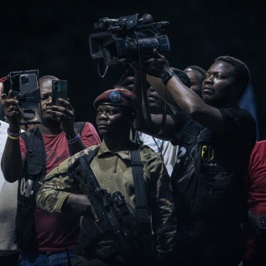 Journalists attend an election rally for president President Felix Tshisekedi in Goma, North Kivu province, Democratic Republic of Congo, on December 10, 2023.