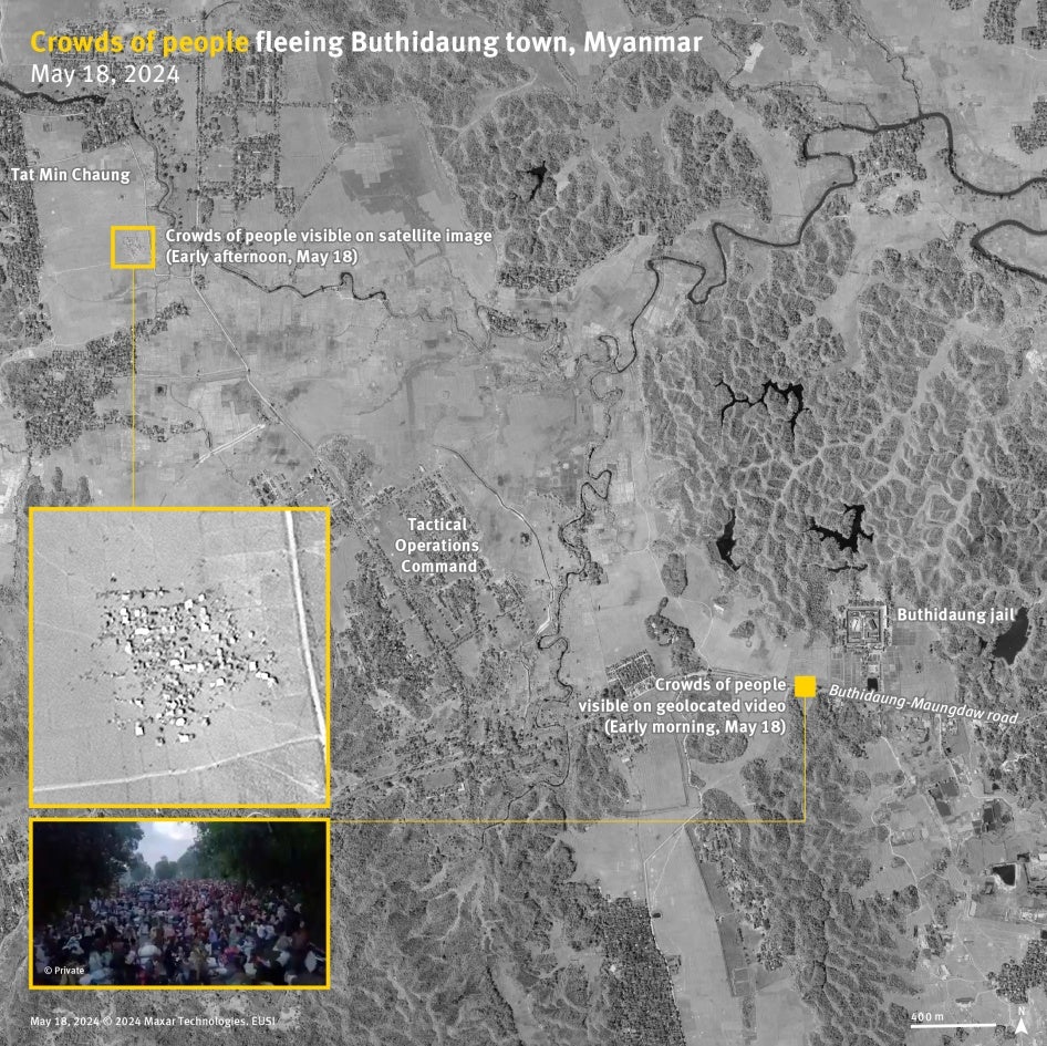 Satellite image showing crowds of people next to Tat Min Chaung village.