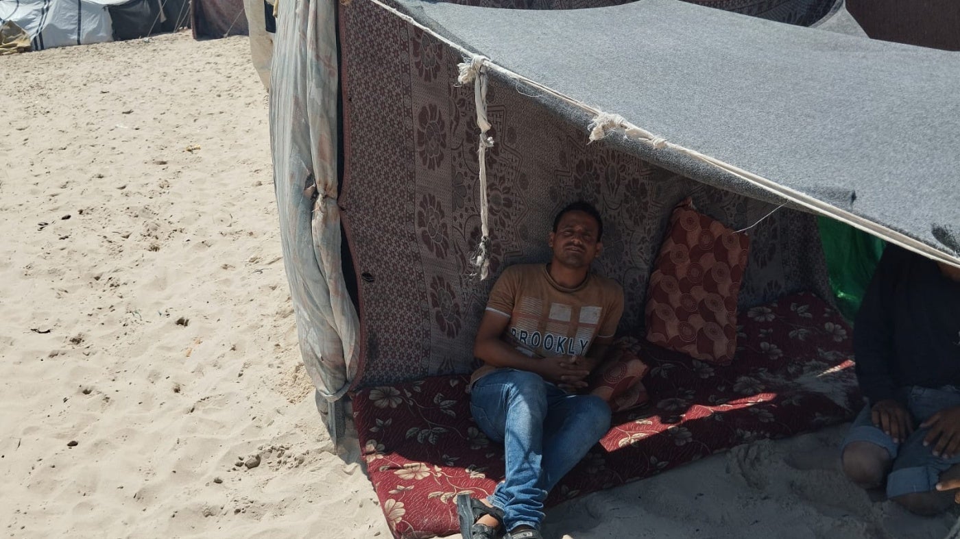 Walid Khalili, sheltering alone in a tent in al-Mawasi, Khan Younis, unable to reach his wife and three boys who are in northern Gaza. The photo was taken on June 18, 2024, about four months following his release from Israeli detention. 