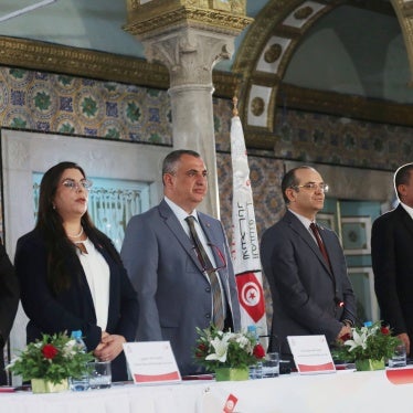 The Chairman of the Independent High Electoral Body (ISIE) Farouk Bouasker, (3-R) at a press conference to announce just three preliminary candidates for the presidential election to be held in Tunis on August 10, 2024. 