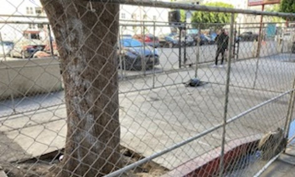 Fence on a sidewalk